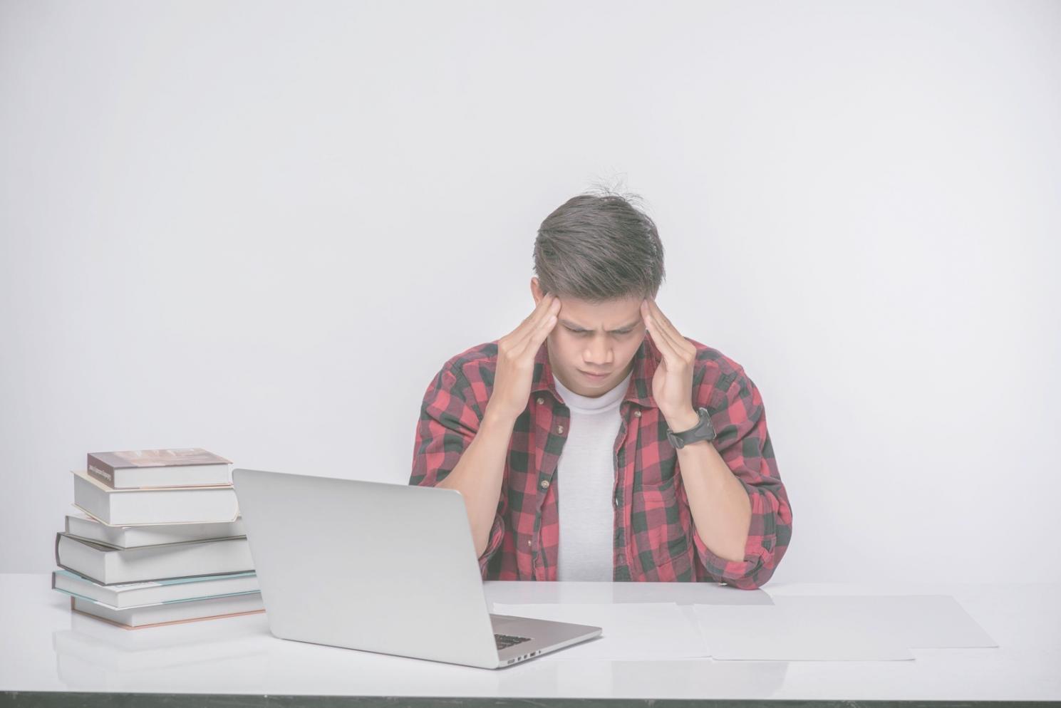 Student reviewing personalized budget analysis with instructor guidance